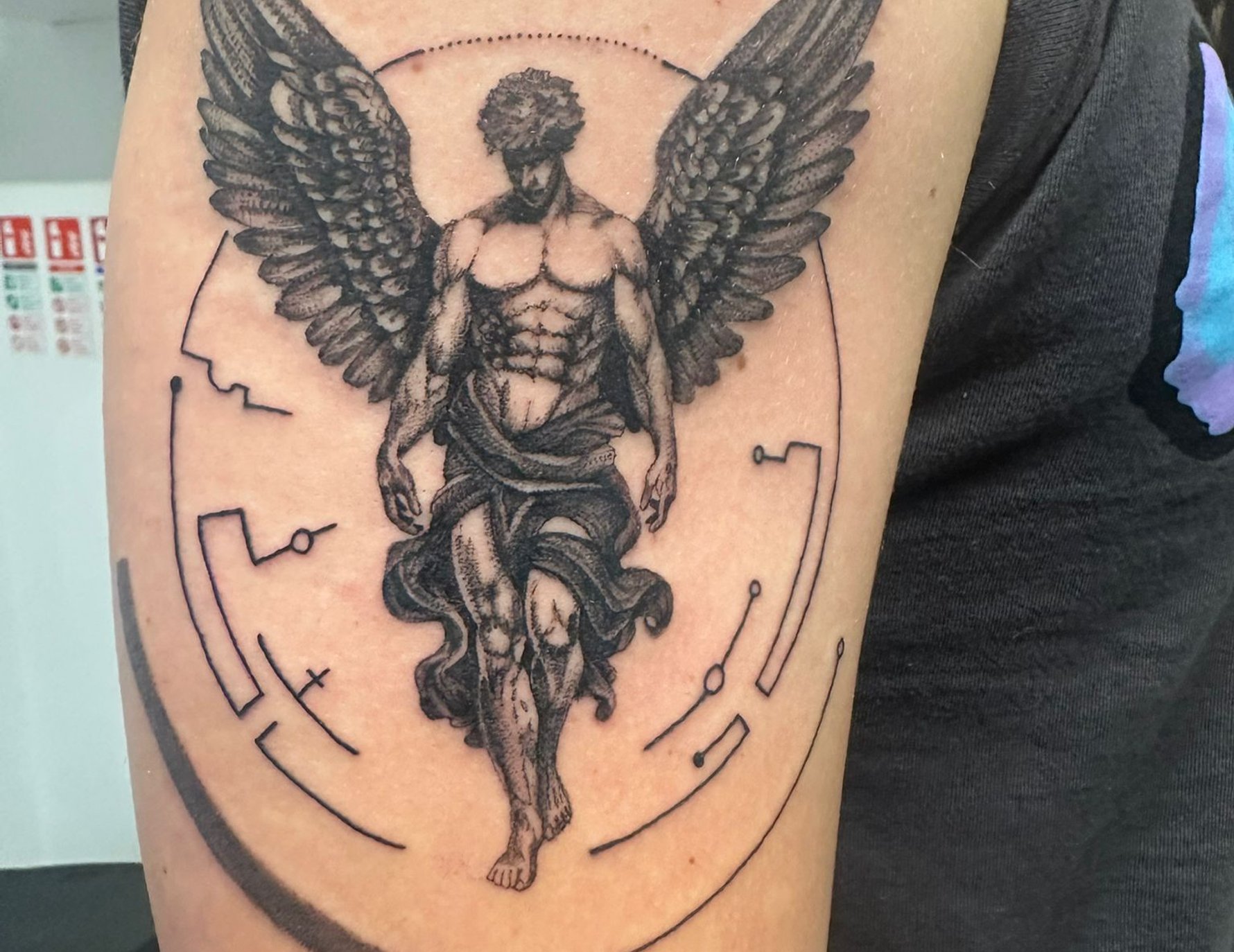 Large-scale back piece tattoo by Saul